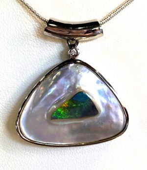Unique Opal Pendant. Solid Opal Seeded Into A Pearl Oyster Then Set With A Diamond In 14ct White Gold.