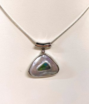 Unique Opal Pendant. Solid Opal Seeded Into A Pearl Oyster Then Set With A Diamond In 14ct White Gold.